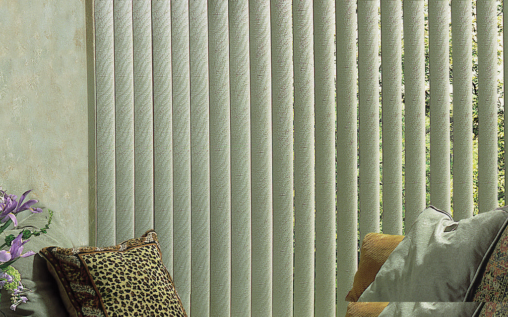 Close view of textured vertical blind vanes rotated part way open