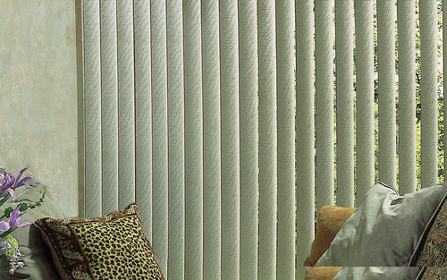 Close view of textured vertical blind vanes rotated part way open